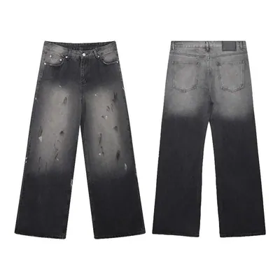 A pair of faded black wide-leg jeans
